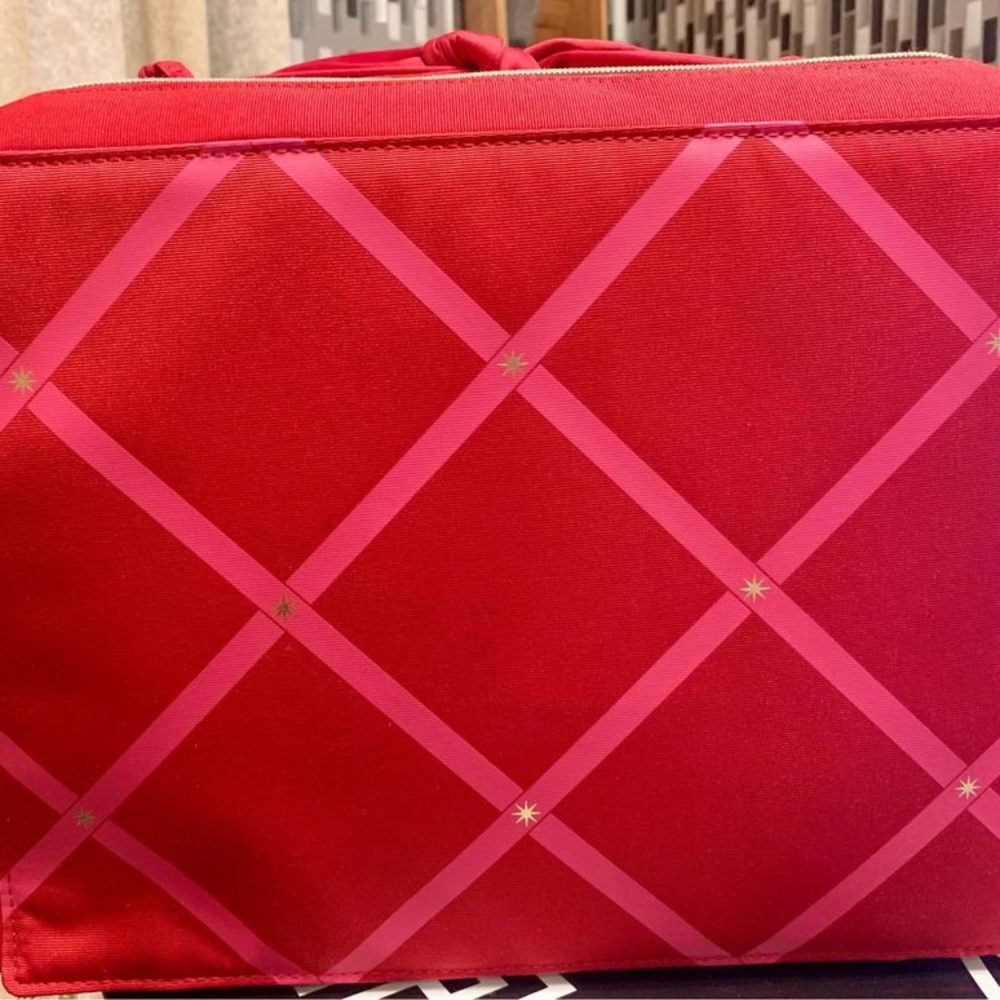 Estée Lauder red makeup bag